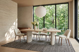 Staffolo dining table in Natural in a Toronto Rosedale house with a travertine wall