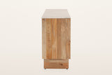 Staffolo sideboard in Natural, end view on a warm white studio backdrop: an end panel of wide mango boards under the marble t