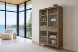 Suvereto display cabinet in Smokey Grey against a limewashed wall in a Rossport house on Lake Superior