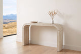 Tarvisio console table in natural in the bright entry of a Calgary foothills house, a wooden bowl and dried grasses on top