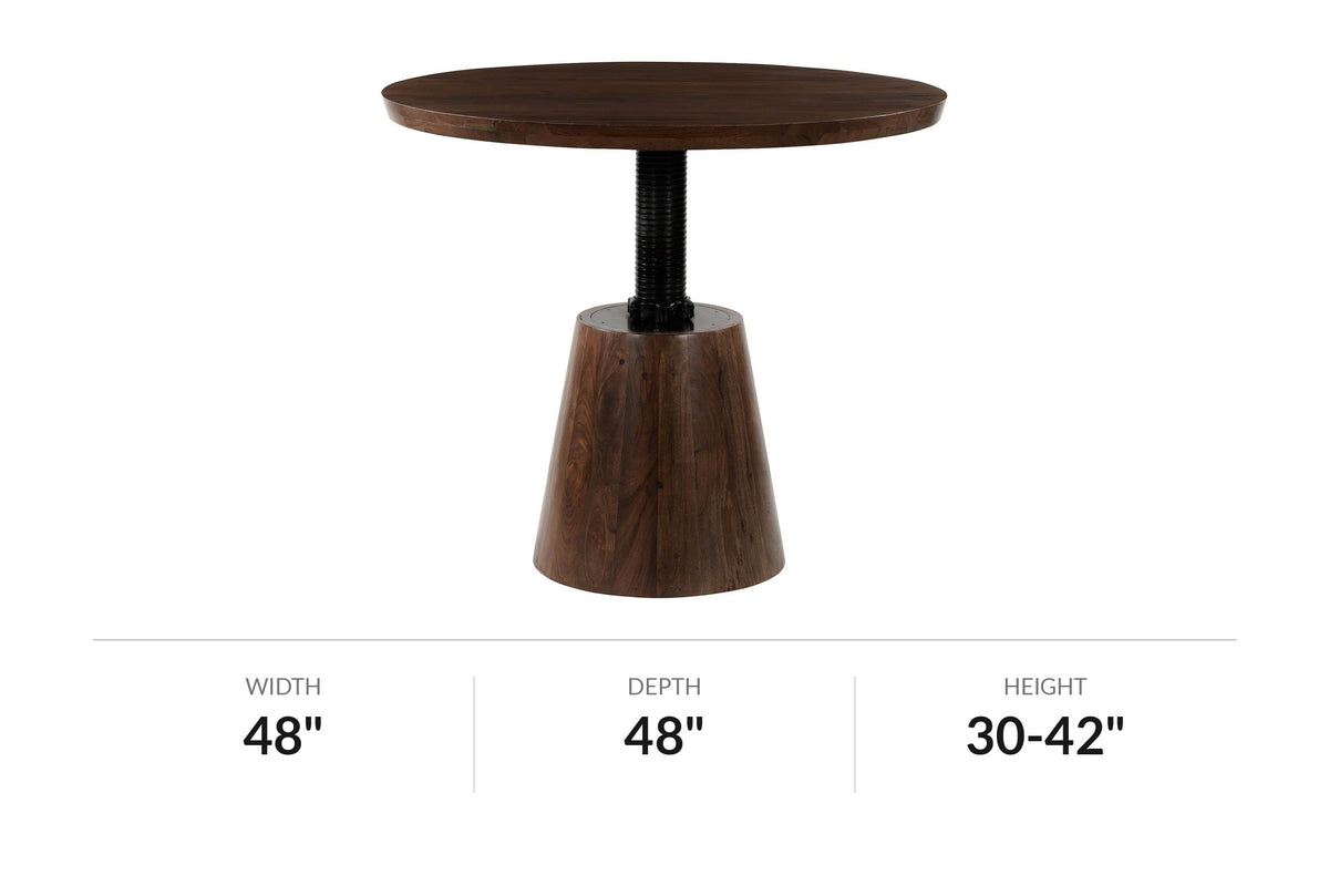 Thorne round dining table raised on its threaded iron column, with inch dimensions