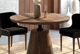 Thorne round table close up, showing the acacia top, iron collar and tapered pedestal