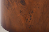 Close-up of the burl veneer finish on the side of a drum: wavy grain, a dark knot and clusters of small burl eyes