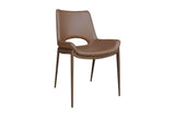 Tobin saddle faux leather dining chair with walnut-finished metal legs, three-quarter view