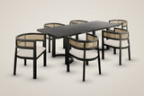 Tolmezzo seven-piece dining set in black: a 95-inch table and six cane-back armchairs with ivory seats