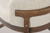 Close-up of the T-shaped joint where a rear post meets the slim wooden rail behind the back