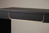 Close-up of the single drawer: a plain black front edged down both sides and along the bottom by a thin gold-tone band