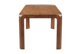 Tristan dining table end view with rounded corners flowing into the legs