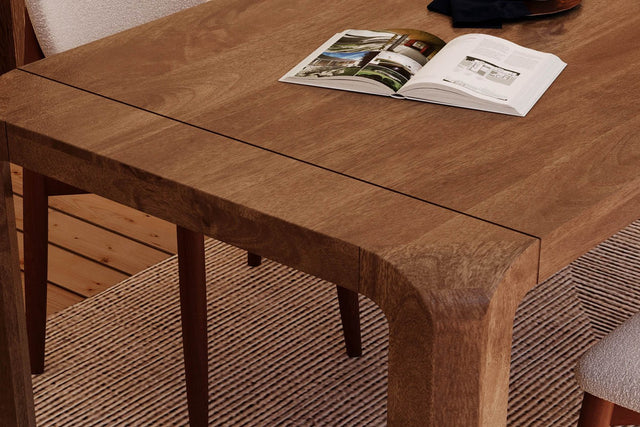Tristan Mango Wood Mid-Century Dining Table - Warm Mango Wood Grain