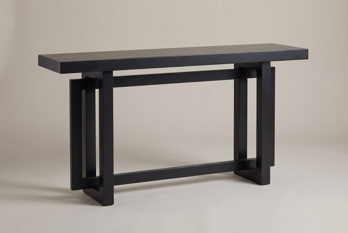 Urbania triple-rectangle console table in black, three-quarter view on a warm grey studio backdrop