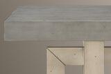 Close-up of the 2.4-inch gray top with its square edge and distressed specks, above a mitred frame corner and the front post