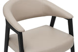 Vance dining armchair close-up of the wraparound faux leather back and cushioned seat