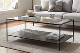 Vaughn glass coffee table in a bright living room in front of a light grey sofa