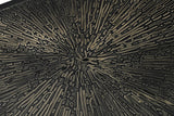 Close-up of the Vaughn console's raised radiating shelf pattern with warm metallic highlights