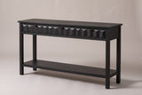 Velletri 3-drawer console table in black, three-quarter view on a warm grey studio backdrop