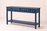 Velletri 3-drawer console table in navy blue, three-quarter view on a warm off-white backdrop