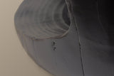 Close-up of the Black Venzone: the dished floor of the hollow and the rounded base edge