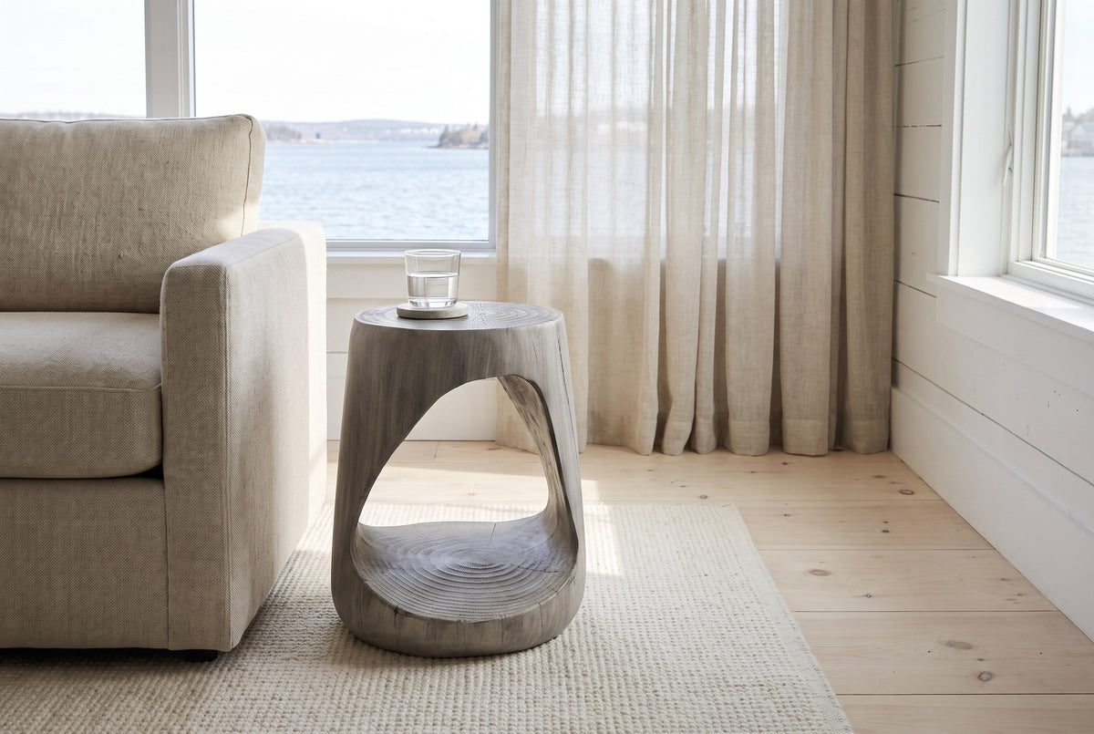 Venzone side table in Grey beside a linen sofa in a bright Halifax living room with a harbour view