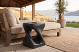 Vicenza side table in Black beside an outdoor lounge on a covered Kelowna patio, the lake and dry hills beyond
