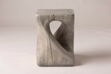 Vicenza side table in Grey, straight front view: a teardrop opening and one band running corner to corner
