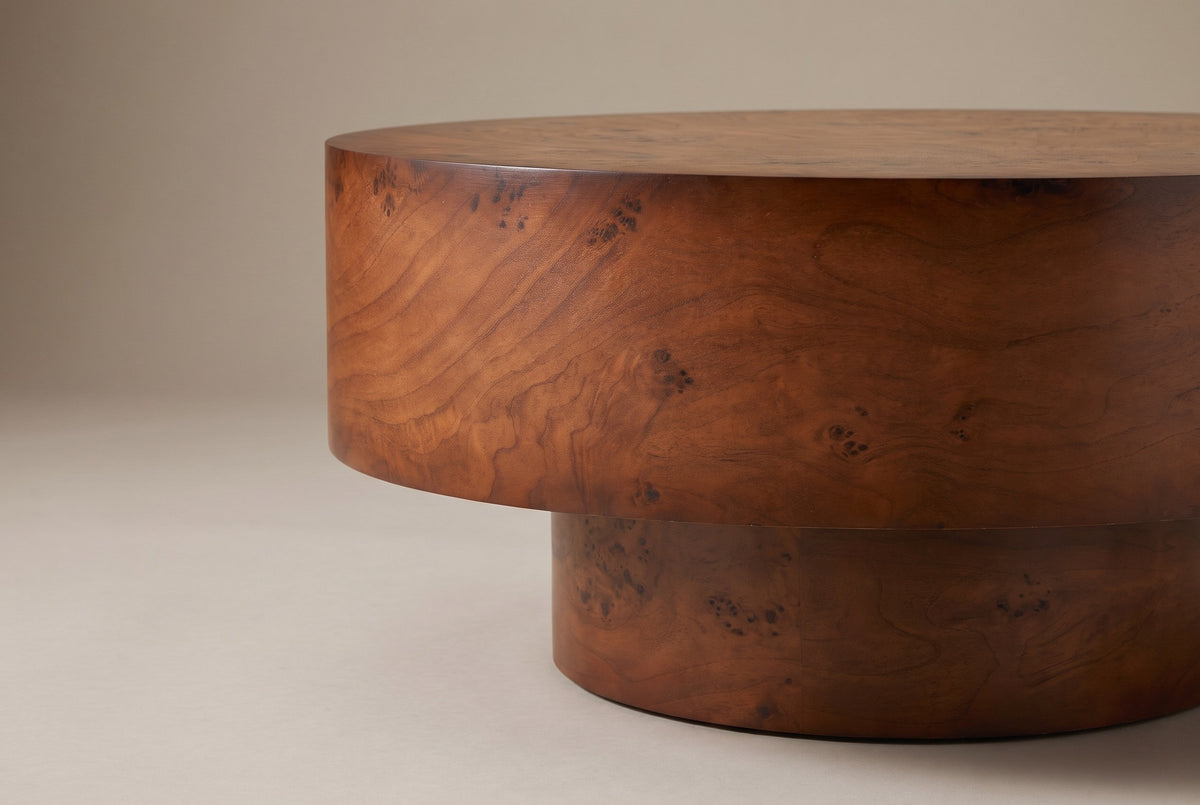 Close-up of the square edge of the top drum and the narrower base set back beneath it