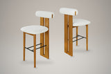 A set of two Vigoleno bar stools in Ivory with walnut-finish frames, three-quarter view on a studio backdrop