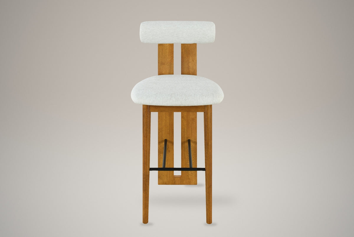 Vigoleno bar stool in Ivory, straight front view: cylindrical bolster back on a slotted walnut-finish plank