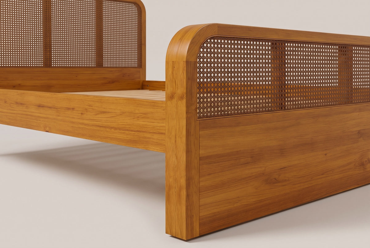 Close-up of the Vinci footboard corner: rounded top, square end post, woven band and plain wood panel
