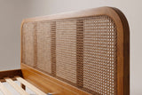 Close-up of the Vinci headboard: the open woven panel, the slim wood uprights behind it and the rounded top corner
