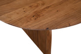 Close-up of a Visso end in Pecan: the slim rounded edge, the bevel underneath and the panel shoulder below