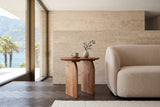 Visso side table in Pecan beside a curved boucle sofa in a lakeside villa, with a travertine wall
