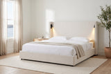 Viterbo bed made up with white linen in a bright bedroom by the harbour, with sheer curtains