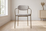 Vitorchiano arm dining chair from the front in a Saskatoon dining room with a painted wainscot and elms outside the window