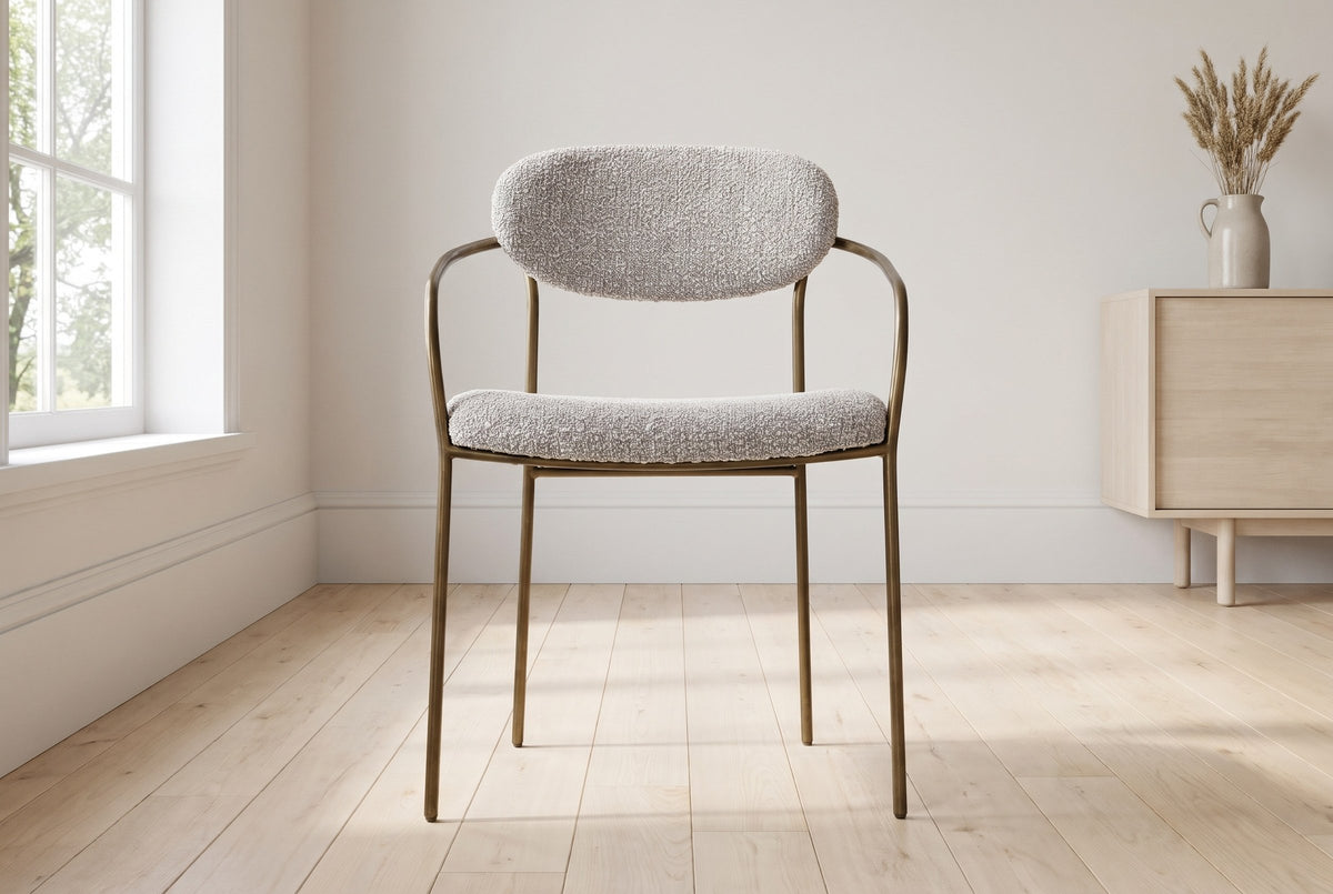 Vitorchiano arm dining chair from the front in a Saskatoon dining room with a painted wainscot and elms outside the window