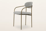 Vitorchiano arm dining chair from the other side: the arm curving back into the hoop, the side rail at seat height and the rear legs rising to the back pad
