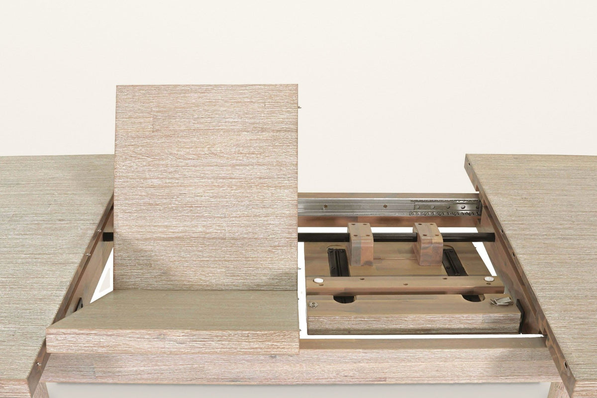 A Vitorchiano folding leaf opening out of the table, with the metal slides of the extension underneath