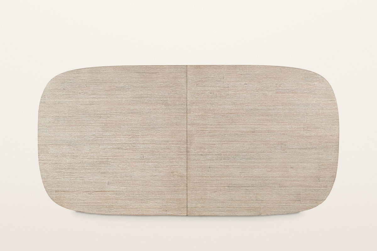 The Vitorchiano top from above, closed: a rounded rectangle in white-washed acacia with one seam across the middle