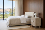 Vitorchiano nightstand in Natural White Wash beside the bed in a Kaleden bedroom above Skaha Lake