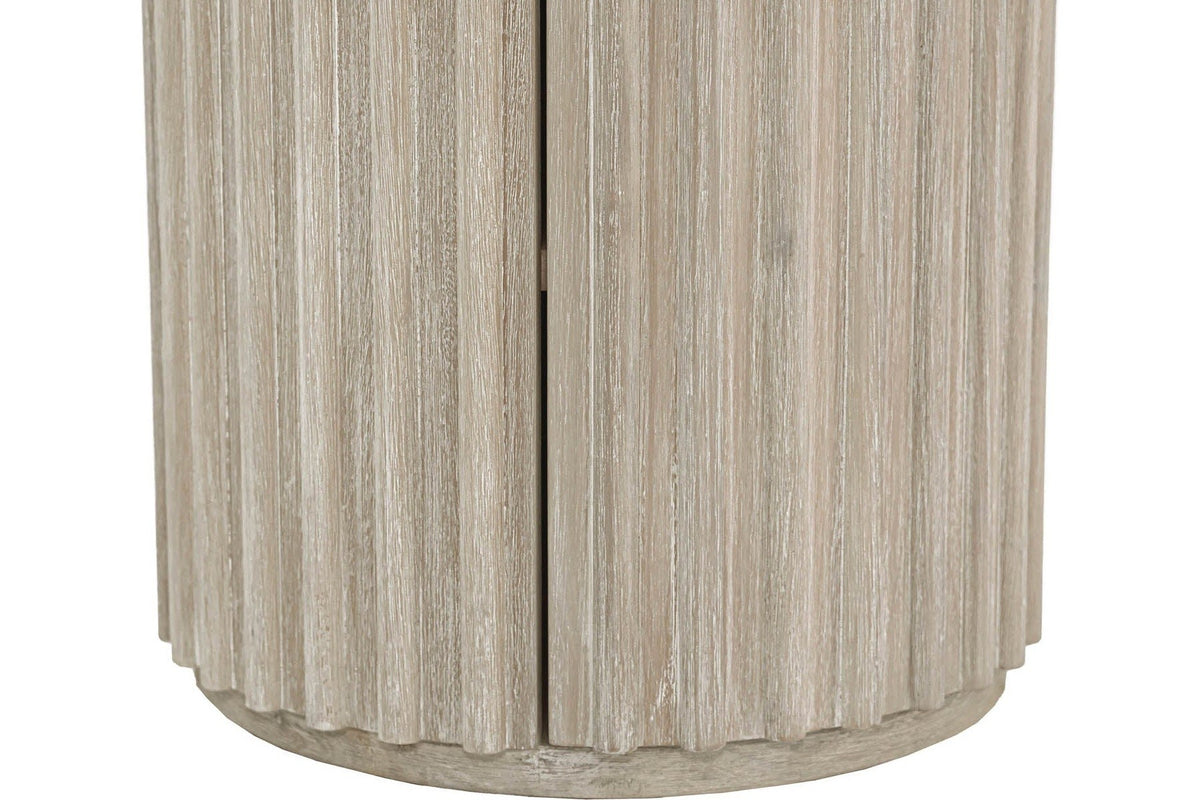 Close-up of the Vitorchiano reeds in Natural White Washed: convex reeds, the two door seams and the recessed round plinth
