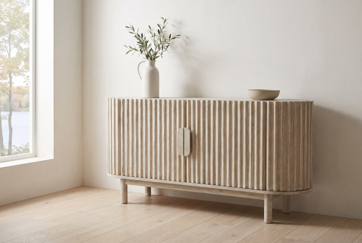 Vitorchiano sideboard in Natural White Wash against a warm white plaster wall in a North Hatley, Quebec dining room, maples and the lake through the window