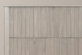 Close-up of the whitewashed beige Volterra headboard: the flat capped top rail