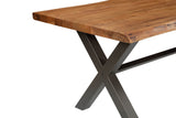 Wexford dining table corner with curved live edge over the iron leg