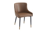 Wilkes brown faux leather dining chair with gold-tipped black metal legs, three-quarter view