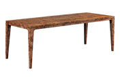Winslow burl dining table in Dark Burl, three-quarter view on a white background: a long burl top over four slender tapered l