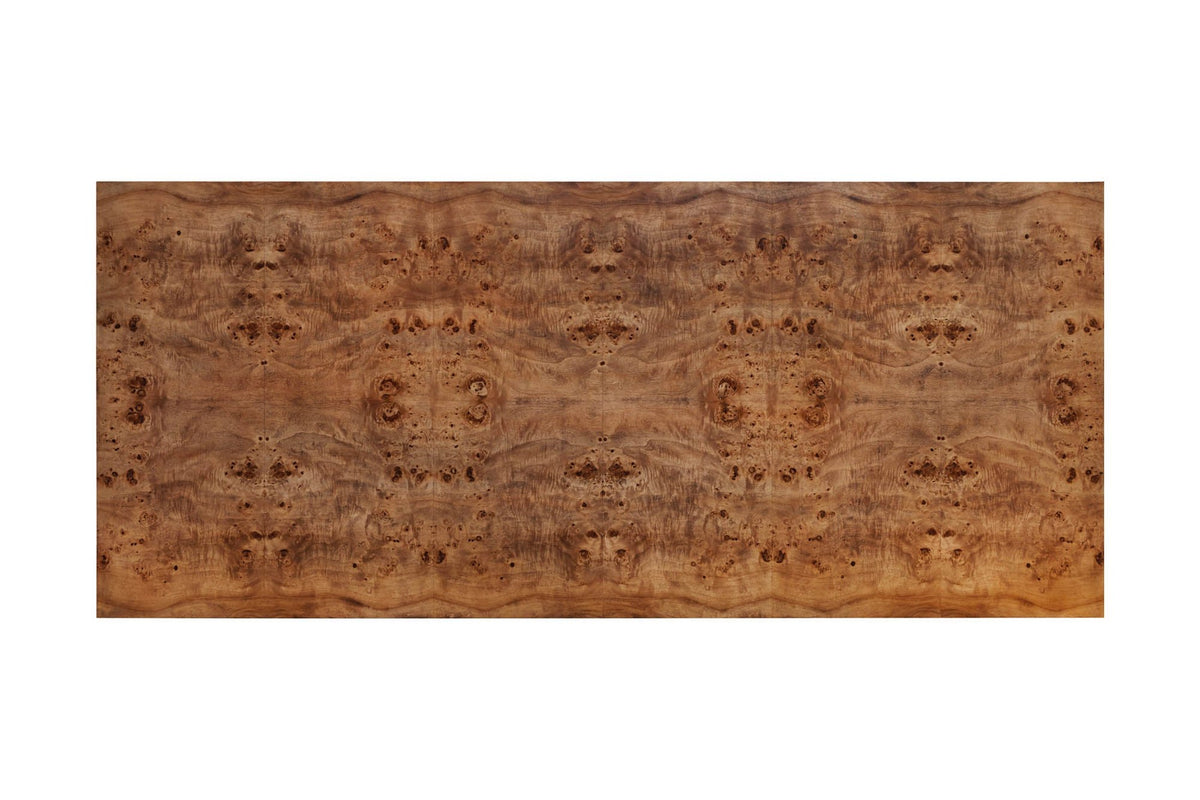 Winslow tabletop seen from above, showing the mirrored dark burl veneer pattern