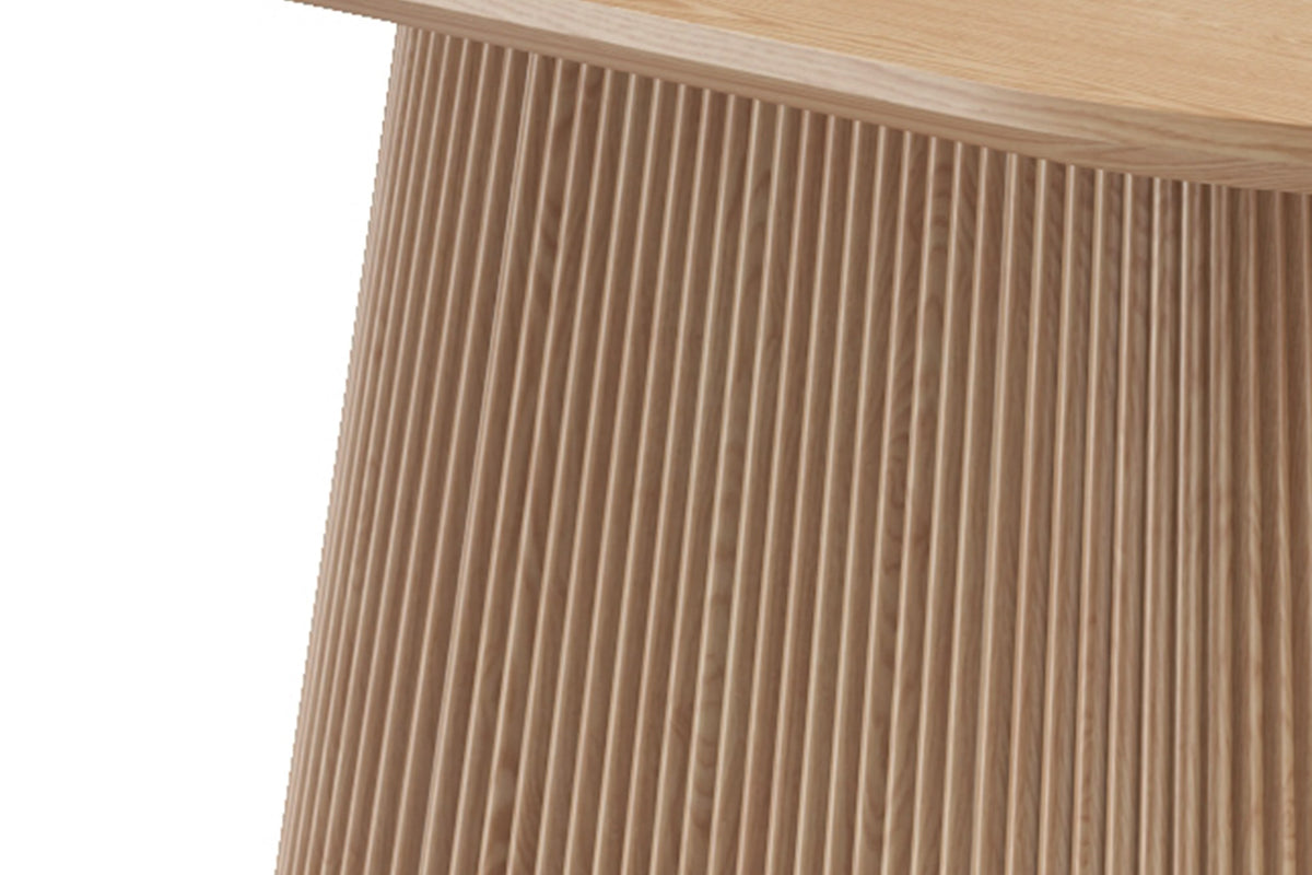 Close-up of the reeded pedestal base and bevelled edge on the Yale table