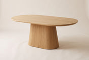 Yale oak veneer oval pedestal dining table in Natural