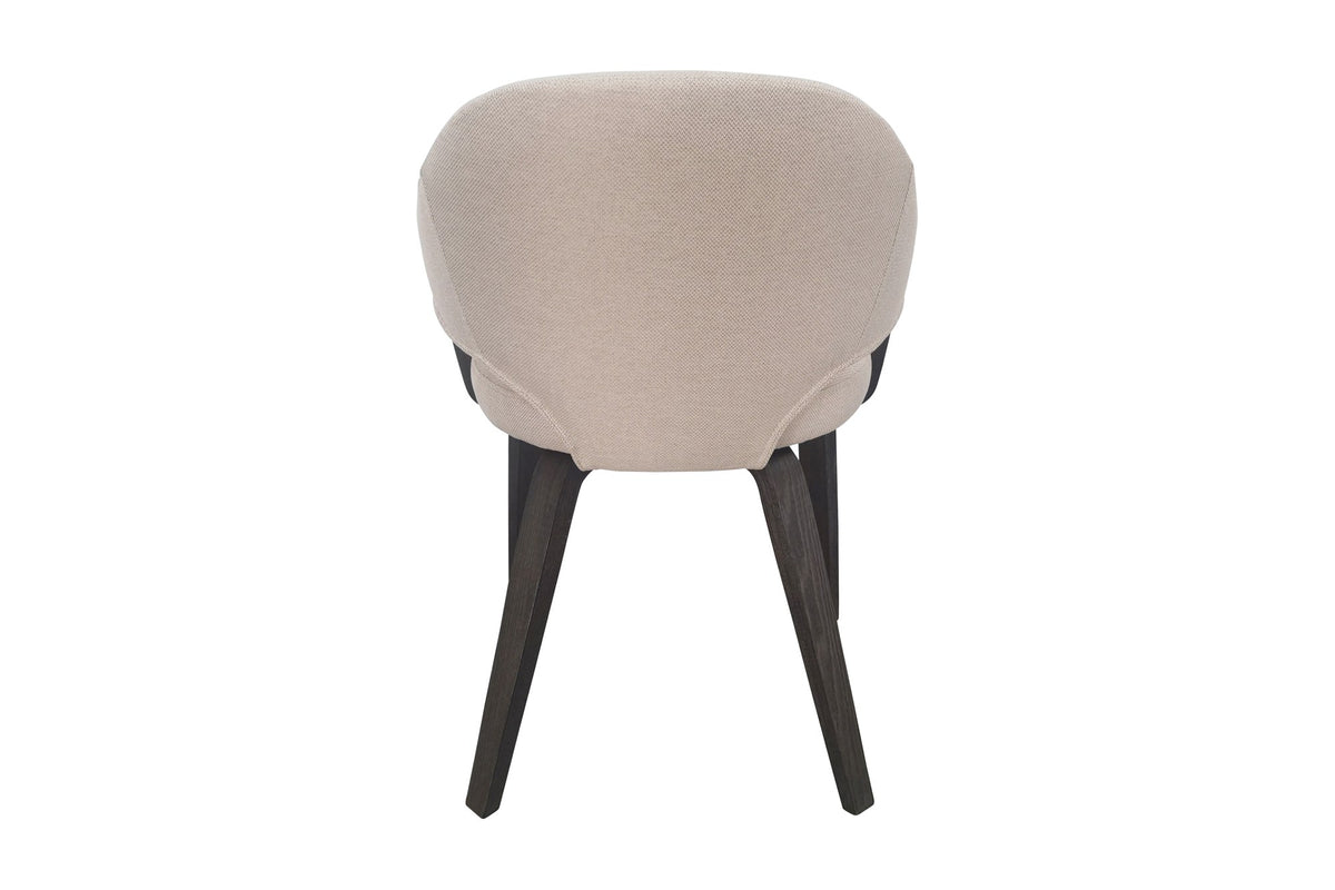 Zane dining armchair, rear view of the rounded upholstered back