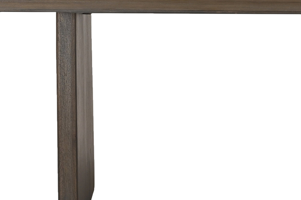 Detail of a thick panel leg on the Zane mango wood dining table
