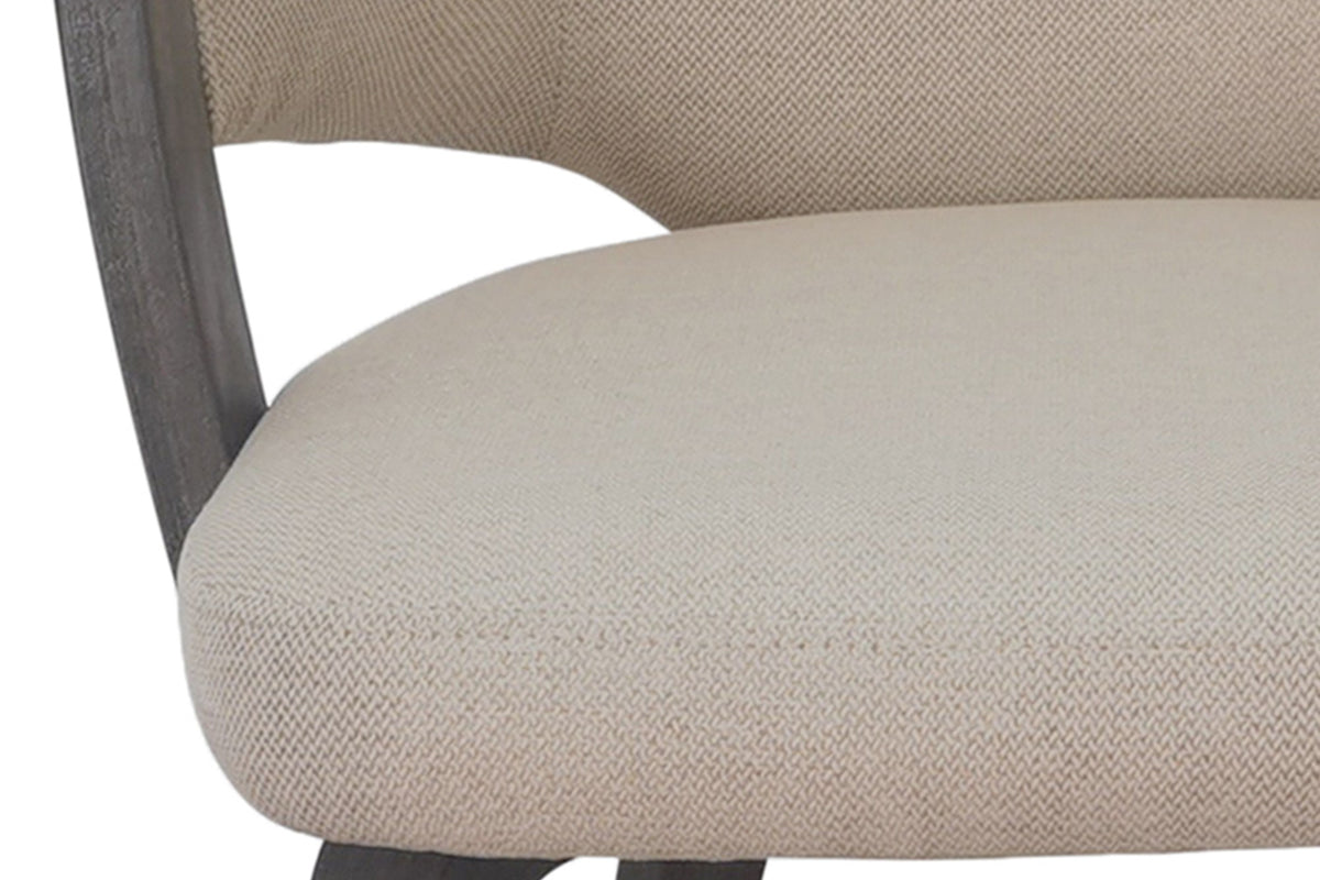 Close-up of the herringbone performance fabric and bentwood arm on a Zane chair